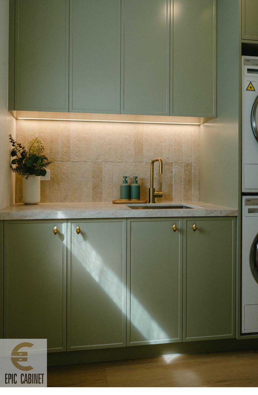 Sage green kitchen McKinnon — Moreland Greens palette with stone benchtops